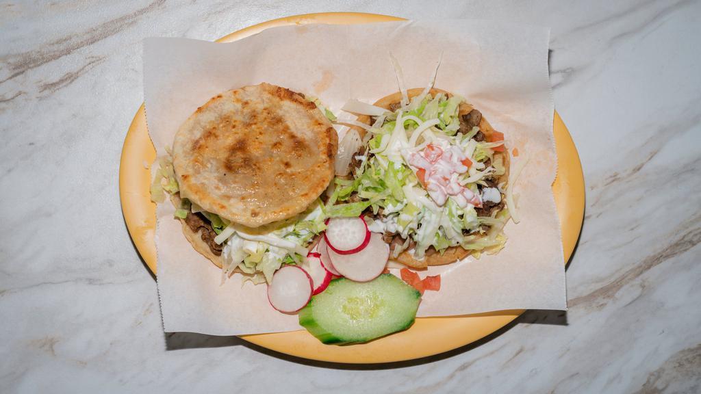 Sopes · Bowl-shaped tortilla, choice of meat, beans, lettuce, tomatoes, cheese, sour cream, cilantro, and onions.
