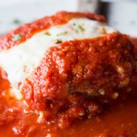 Lasagna Full Dinner · It’s addictive! Homemade with meat sauce or marinara, baked with mozzarella.

Served with So...