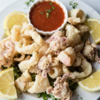 Fried Calamari · Served with house cocktail sauce & lemon wedges.