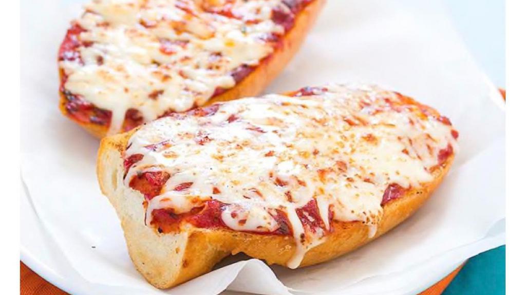 Pizza Bread (Double) · With pizza sauce, baked in our brick oven with mozzarella on garlic bread.