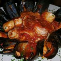 Zuppa Di Pesce Dinner · Fresh black mussels, jumbo shrimp, calamari and clams over Pasta with marinara or arrabiatta...