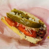 Turkey Polish · A turkey sausage char grilled on a poppy seed bun and topped like our hot dogs.
