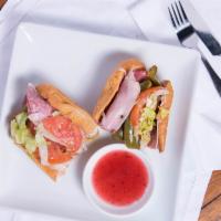 Italian Hoagie · Capicola, Genoa salami, and ham. Served with onions, tomatoes, lettuce, sweet peppers and pr...
