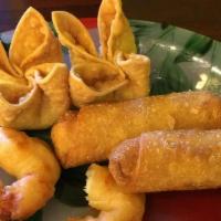 Platter · Combination appetizer of two egg rolls, two pieces of crab Rangoon, and two fried shrimps.
