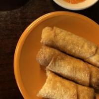 Egg Roll · Hand-rolled with marinated chicken and vegetables. Served with sweet dipping sauce.