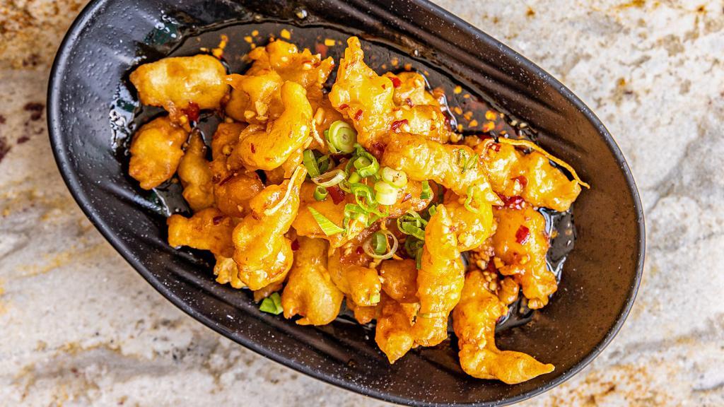 Orange Chicken (Large) · Breaded, topped with green onion, orange peels; spicy brown sauce.
