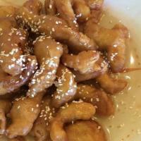 Honey Chicken · Breaded chicken, topped with sesame seeds in a sweet honey sauce.