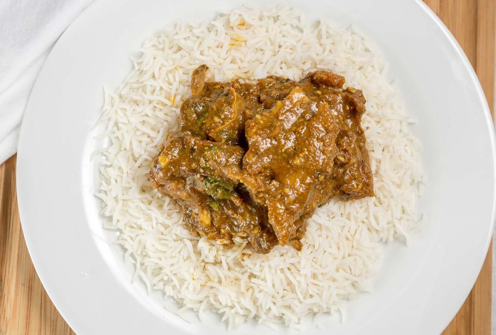 Lamb Masala · Lamb pieces, sauteed with authentic Indian spices and cooked to perfection.