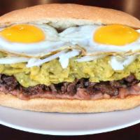 La Rana · Green Chilaquiles, Steak, 2 Eggs, Sour Cream, Raw Onions, Queso & Refried Beans. One Bag of ...