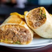 Burrito El Mexicano · Choice of Your Favorite Meats, 2 Eggs Cooked with Fresh Jalapeños, Tomatoes & Onions. Refrie...