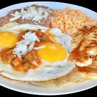 Huevos Estrellados Y Carne Plato. · Two Eggs, Topped with Tomatoes, Onions & Homemade Red Spicy Salsa . Served with Rice and Ref...