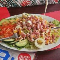 Chef Salad · Crisp lettuce, ham, cheese, tomato, onion, and a hard boiled egg.