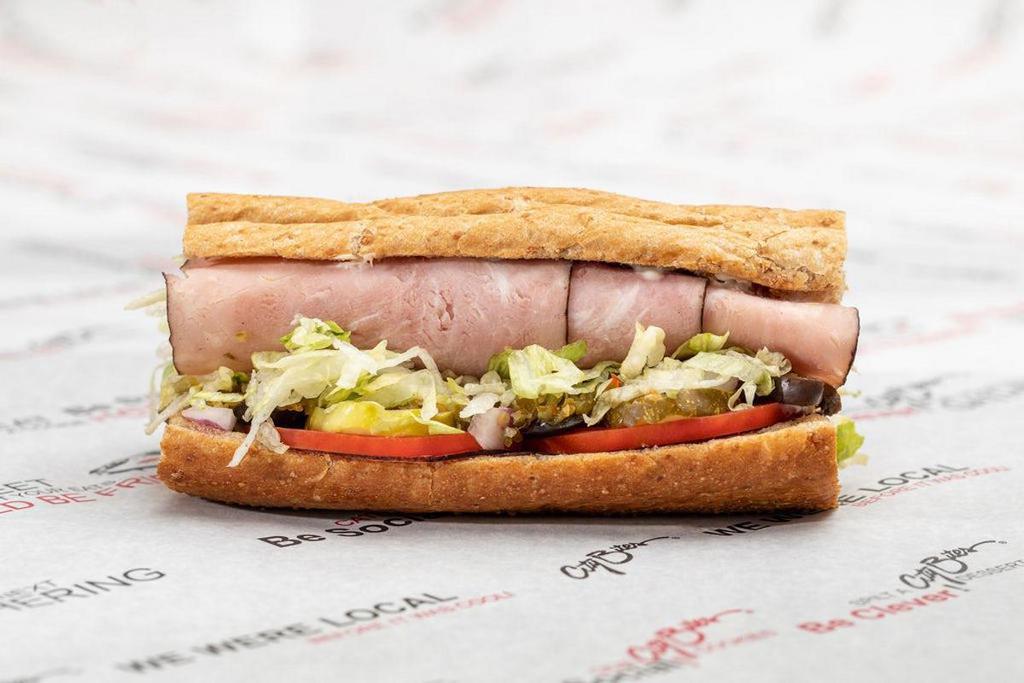 Ham & Provolone · Dressed with lettuce, tomatoes, red onions, pickles, black olives, crushed cherry peppers, blended oils, mayo, salt & pepper
