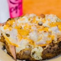 Mesquite Chicken Spud · Grilled chicken, ham, City Bites' ranch dressing, melted marble jack cheese & margarine