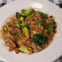 Pad See-Ew · Sauteed flat noodles with egg, cabbage, carrot, broccoli and Thai sweet soy sauce