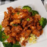 Volcano Chicken · Lightly batter fried chicken sauteed in sweet and hot chili sauce served on the bed of steam...