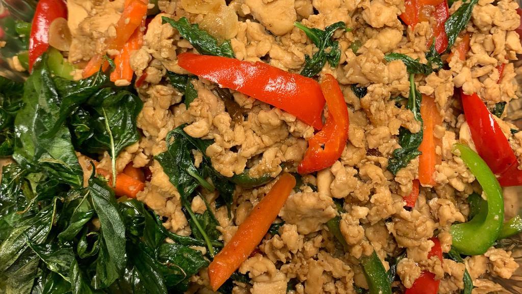 Spicy Basil  Chicken · Ground chicken bell pepper, green bean, onion, carrot, basil with spicy basil sauce