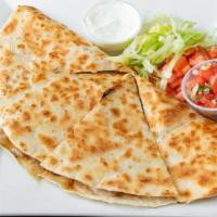 Quesadillas · Cheddar and mozzarella cheese smothered in a grilled tortilla; served with lettuce, tomato, ...