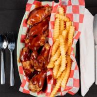 Madd Savory Wings Basket · Six deep fried wings served with fries. Your choice of sauce: hickory smoked barbeque, garli...
