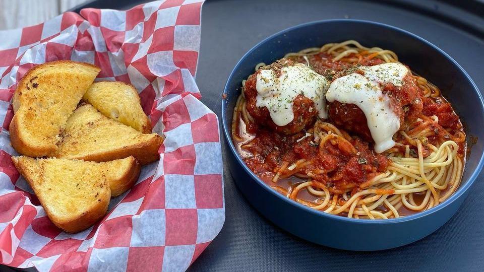 Spaghetti & Meatball · Spaghetti and homestyle meatballs served with garlic bread.