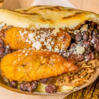 Pabellon Arepa · White cheese, black beans, plantains and shredded beef.