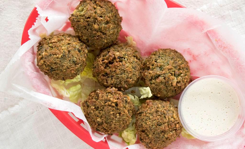 Falafel Pieces · Chickpeas and potato, ground together with a mixture of herbs and spices. Deep fried upon order.