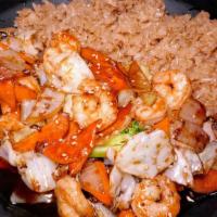 Shrimp Teriyaki · Include cabbage onion carrots and broccoli with fried rice on the side.
