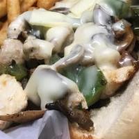 Chicken Philly · Topped with sautéed onions, mushrooms, peppers, and melted white American cheese