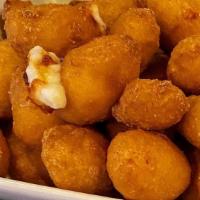 Wisconsin Cheese Curds · Fried cheese served with Marinara or Ranch