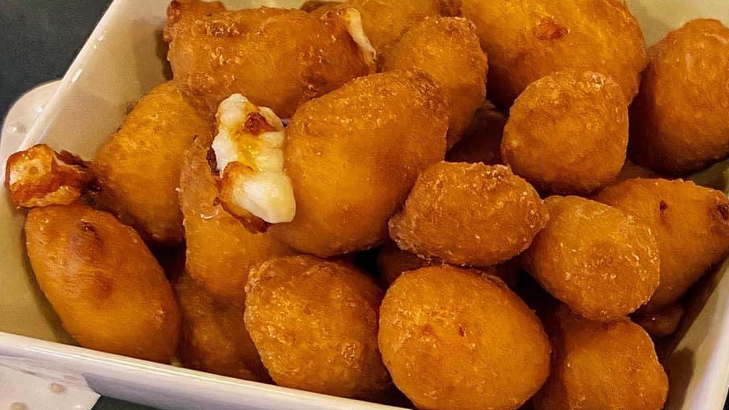 Wisconsin Cheese Curds · Fried cheese served with Marinara or Ranch
