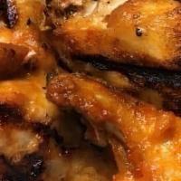 Kids Char-Buffed Wings (4 Wings) · Served with a side and cookies