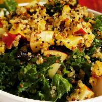 Kale Quinoa Salad · Super-punch from super foods.  Iron-rich kale, quinoa, apples, turmeric and raisins in lemon...