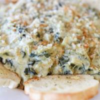 Italian Artichoke Dip · Artichoke hearts seasoned in our homemade Italian dressing and baked with a blend of cheeses...
