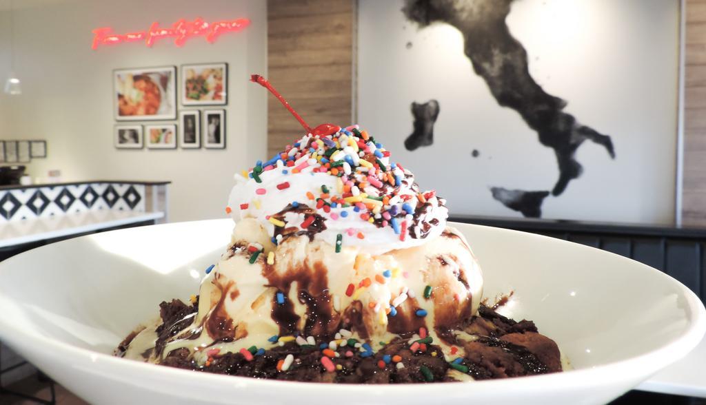 Louie'S Cookie Sundae  · Warm jumbo chocolate chip cookie topped with vanilla ice cream, whipped cream, chocolate sauce, sprinkles, and a cherry!