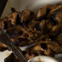 Chicken Satay (5) · Gluten-Free. A favorite here and in Thailand. Chicken skewers marinated in Thai curry & herb...
