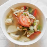 Tom Yum (Small) · Thai hot and sour soup, made with lemongrass, galanga, lime leaves, onions, mushrooms and ci...