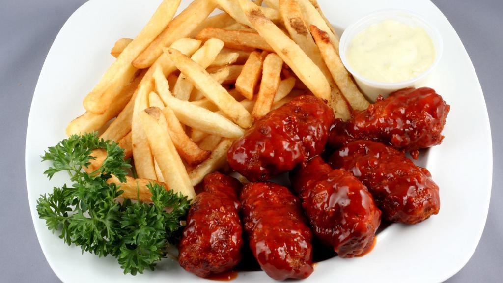 Mild Wings With Fries · Delicious chicken wings baked, then deep-fried to perfection and tossed in Mild hot sauce. Served with a side of Fries.