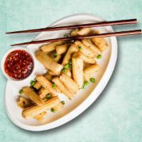 Smackin' Chilli Babycorn · Babycorn stir-fried and sauteed in our special chilli sauce.