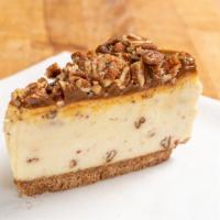 Caramel Pecan Cheesecake · New York style cheesecake with caramel topping and pecan pieces

~1/2 lbs