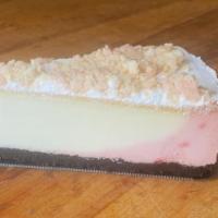 Strawberry  Sensation Cheesecake · Strawberry cheesecake with  strawberry wafer topping.