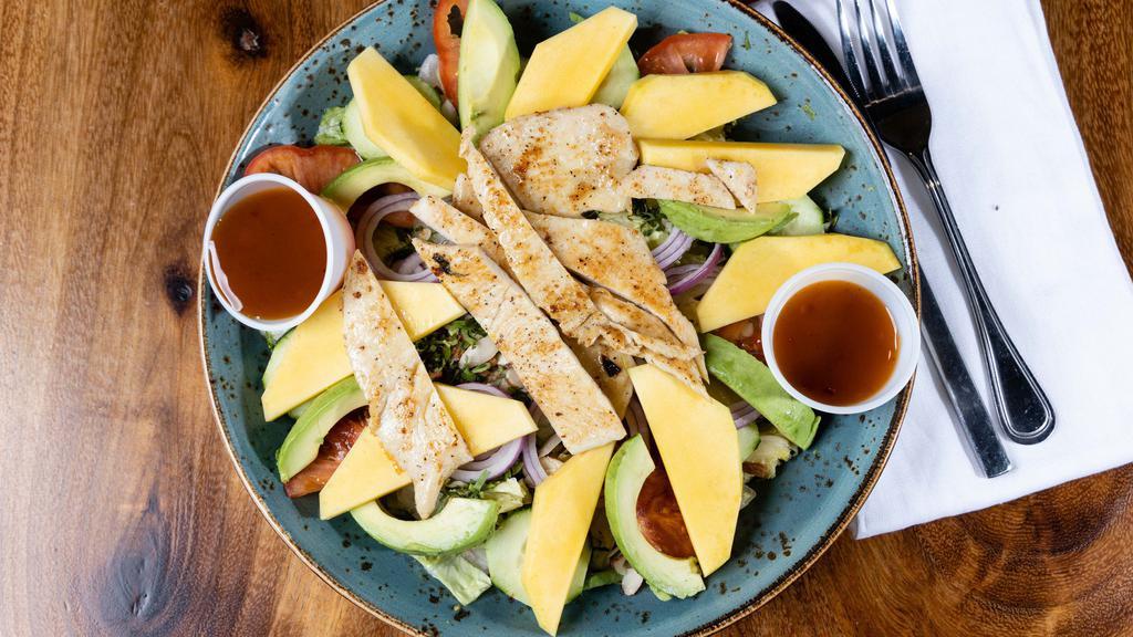 Mango Salad · Romaine lettuce, chicken breast sliced, fresh mango, avocado, red onions, cucumber, tomatoes, cilantro with house made dressing and toasted almonds.