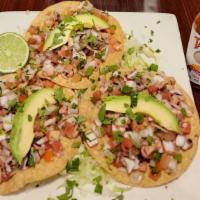 Tostadas De Ceviche · Tilapia, Shrimp, Octopus or Mix Tostada.
Your choice of meat chopped with onion, tomatoes, c...