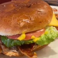 Lupita'S Burger · American cheese, bacon, grilled onion, jalapeño, lettuce, tomato, mayonnaise, mustard, side ...