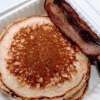 Buttermilk Pancakes · Local maple syrup.