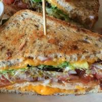 Lula '99 Turkey Sandwich · Avocado, tomato, lettuce, red onion, sprouts, and chile aioli. With cheddar and/or bacon, ad...