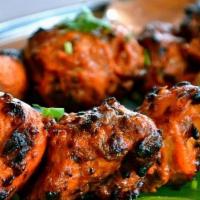 Chicken Tikka Appt · Marinated in mild spices, skewered and grilled in the clay oven.