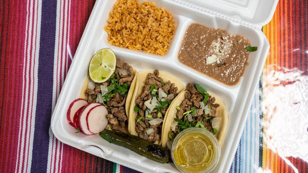 3 Street Tacos Lunch · Mexican Street tacos served with rice, beans, and a drink