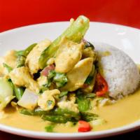 Yellow Curry Chicken · Baby bok choy, green beans, carrots, peas, seasonal vegetables, yellow coconut curry sauce.