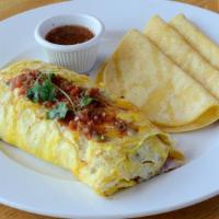 Pablo’S Omelet · Three Egg Omelet with White Rice, Refried Beans, Grilled  Onion, Cheddar Cheese & Tomato.  S...