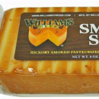 Smoked Swiss · Smoked using real hickory chips  Our award winning cheese is hickory smoked with a creamy te...